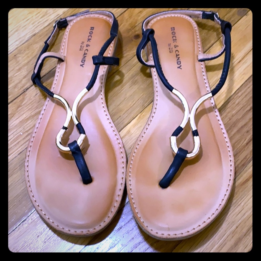 Beige and black sandals